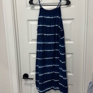 Size large sun dress. Navy tie dye.  Double layers.  Key hole tie in back.